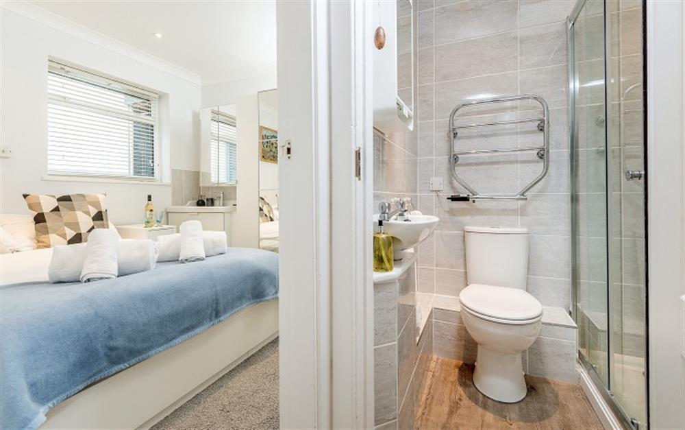The shower room is between the lounge and the master bedroom. at Riverside in Helford Passage