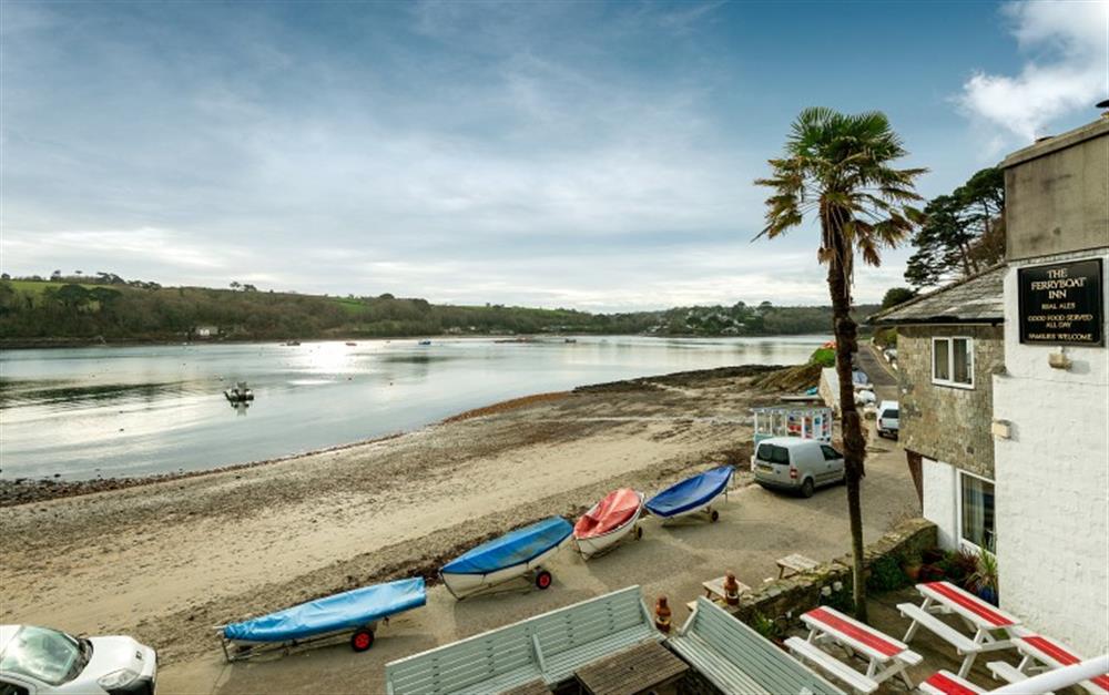 View of the beach from the balcony. at Riverside in Helford Passage