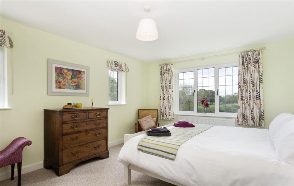 Double bedroom with a super-king bed at Riverside House, Bidford-on-Avon