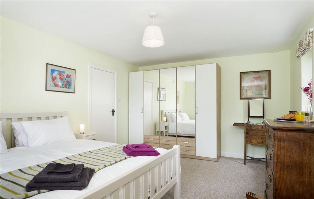 Master bedroom with a super-king bed at Riverside House, Bidford-on-Avon