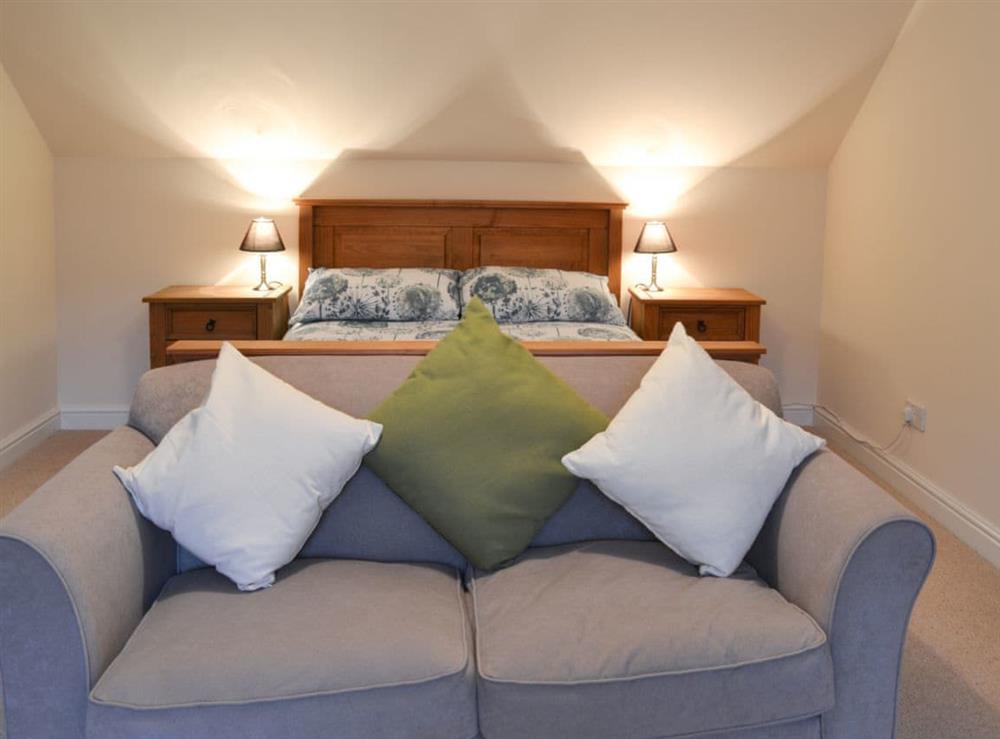 Double bedroom with sofa at Riverside in Kimelford, near Oban, Ayrgyll and Bute, Argyll
