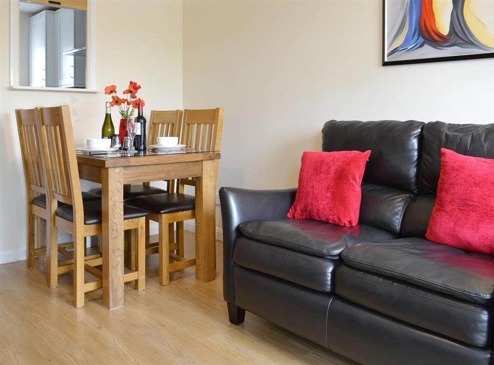 Comfy seating within living and dining room at Riverside Mews in Bideford, Devon