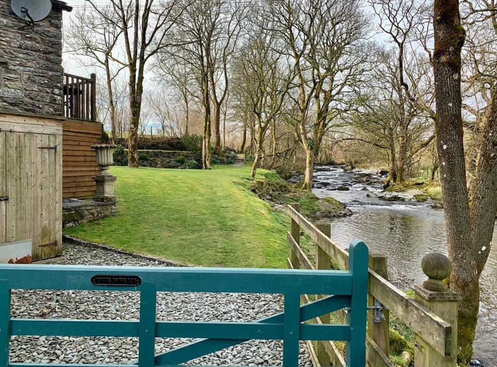 Garden at Riverside Mill & Glamping Pod in Patton, near Kendal, Cumbria