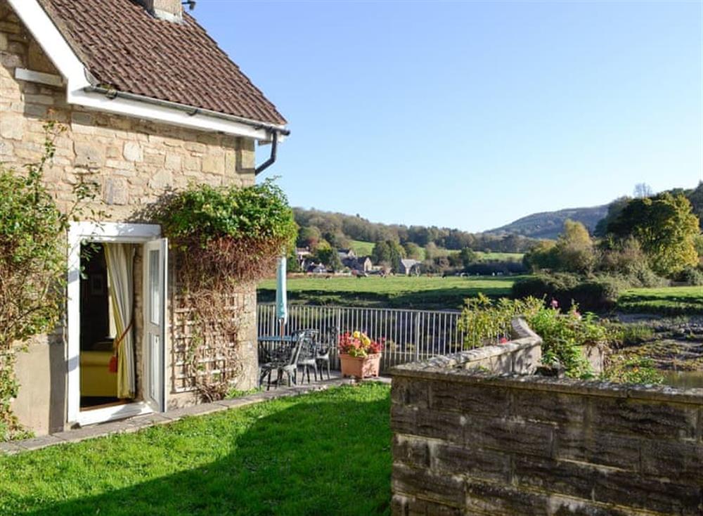 Tranquil 18th-century, detached holiday cottage lies on the River Wye at Riverside in Tintern, near Monmouth, Gwent