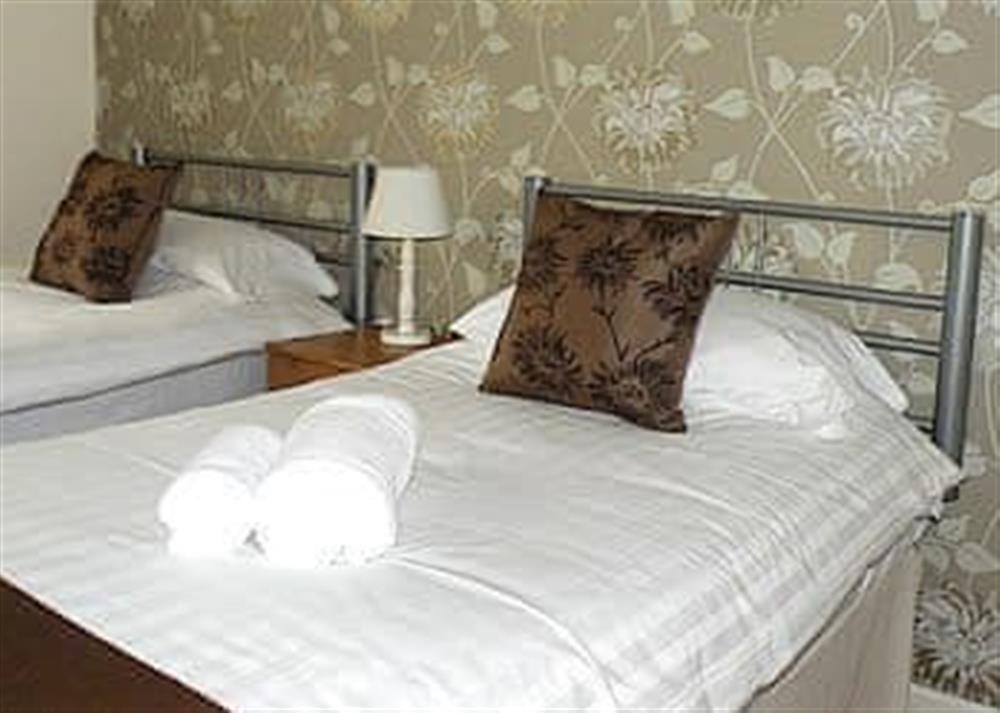 Twin bedroom (photo 2) at Riverside Villa in Liskeard, Cornwall