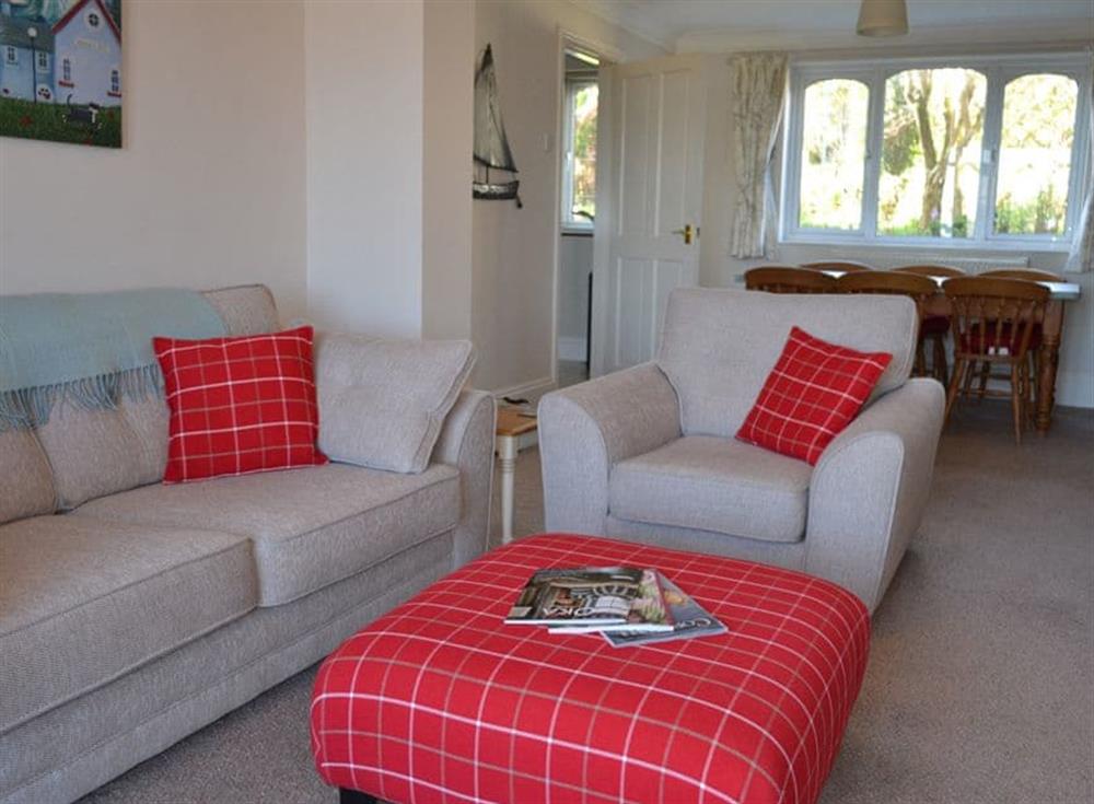 Sitting room with dining area at Riverview, 20 Park Road in Fowey, Cornwall