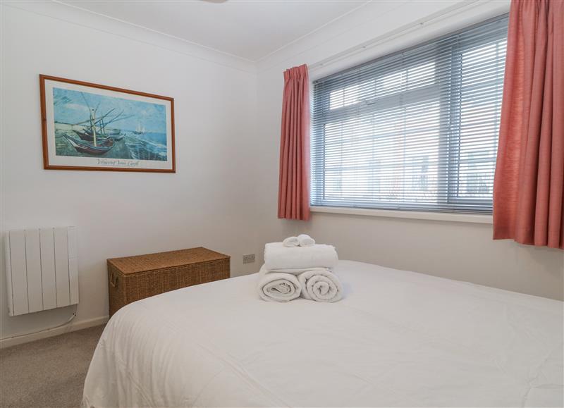 This is a bedroom at Riverview Apartment, Cemaes Bay