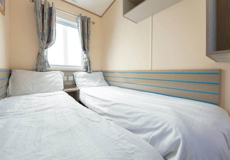 Twin bedroom in a caravan at Riviere Sands in Hayle, South Cornwall