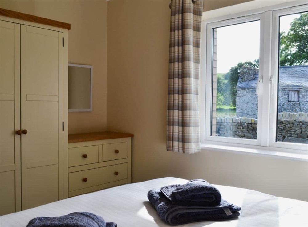 Bedroom with kingsize bed (photo 2) at Roath in Cilcennin, near Aberaeron, Dyfed