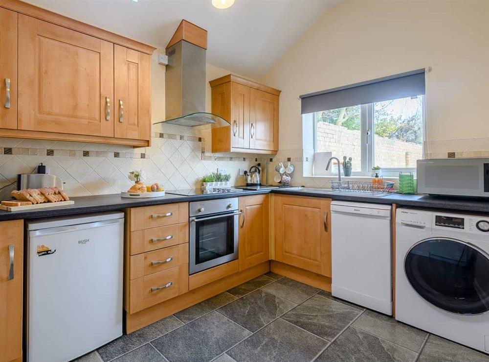 Spacious kitchen with laundry facilities at Robins Barn in Skegness, Lincolnshire