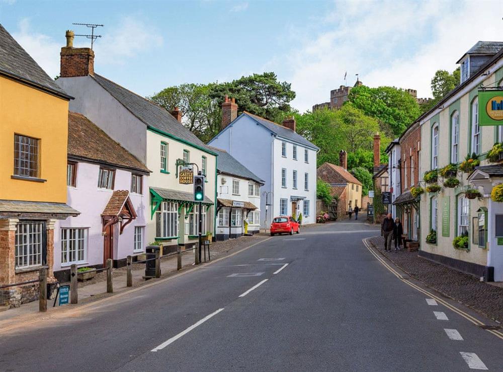 Dunster high street - property on the left above the coffee shop