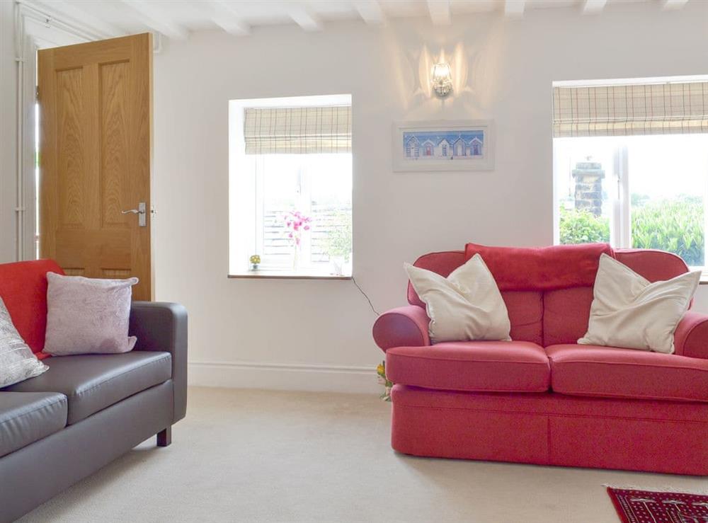 Spacious living room at Rock Cottage in Birchover, near Matlock, Derbyshire