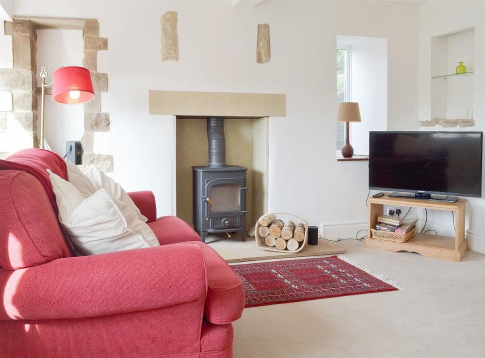 Welcoming living room at Rock Cottage in Birchover, near Matlock, Derbyshire