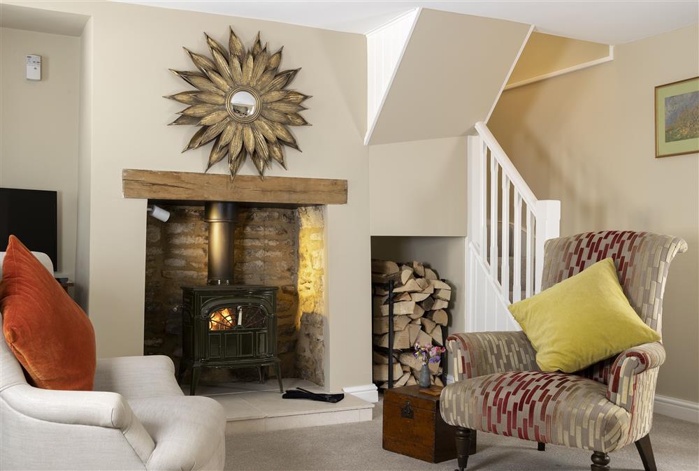 Ground floor:  Settle in by the fireside after a day out exploring the local area at Rock Cottage, Minchinhampton