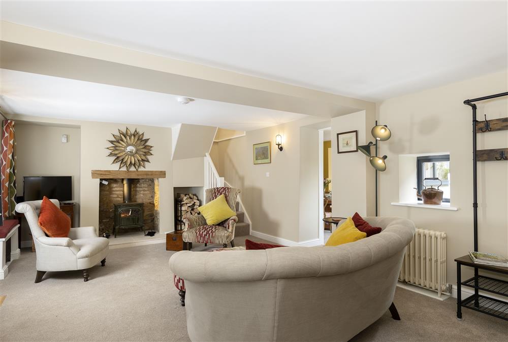 Ground floor: The spacious sitting room is elegantly decorated to complement the traditional features