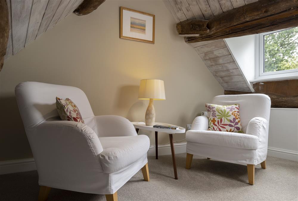 Second floor: The reading snug, is the perfect spot to curl up with a book  on a rainy day at Rock Cottage, Minchinhampton