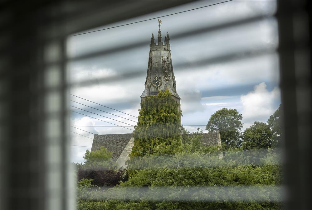 View of the spire of The Holy Trinity Church in Minchinhampton at Rock Cottage, Minchinhampton