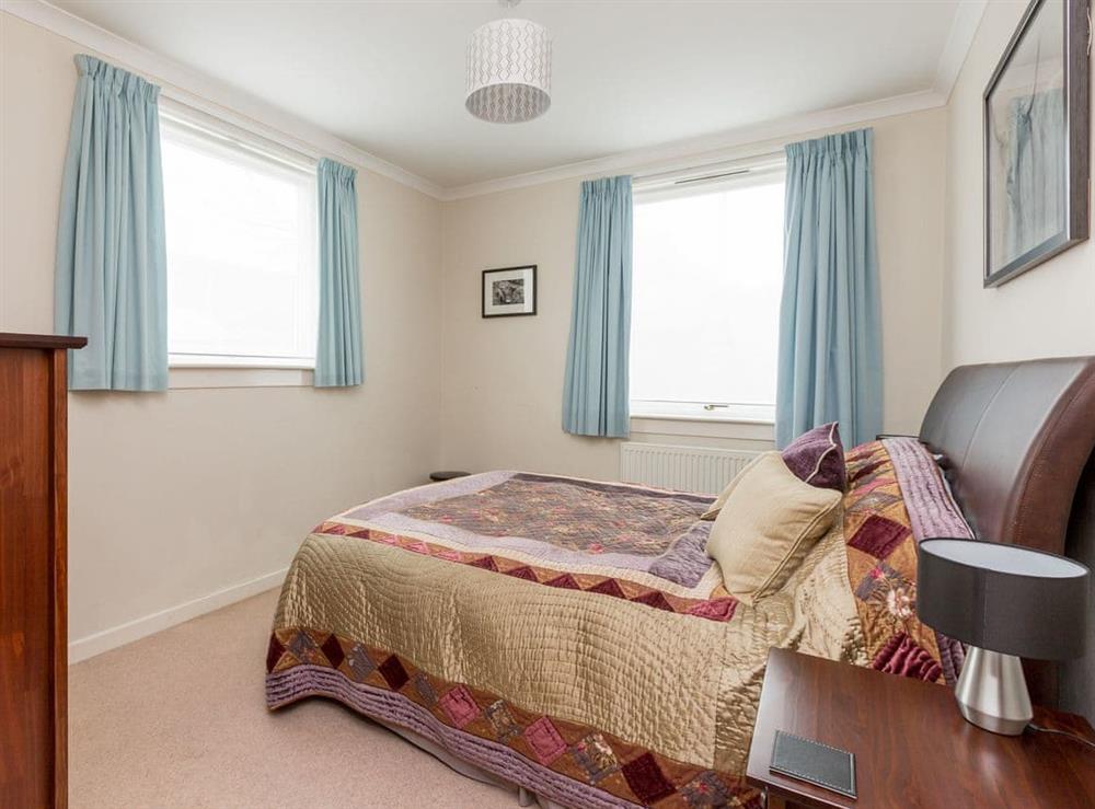 Double bedroom with kingsize bed at Rockcliffe Cottage in South Queensferry, near Edinburgh, West Lothian