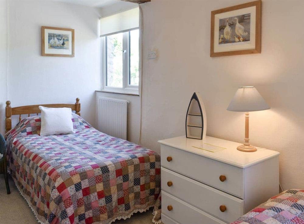 Comfortable twin bedroom at Clock Cottage, 
