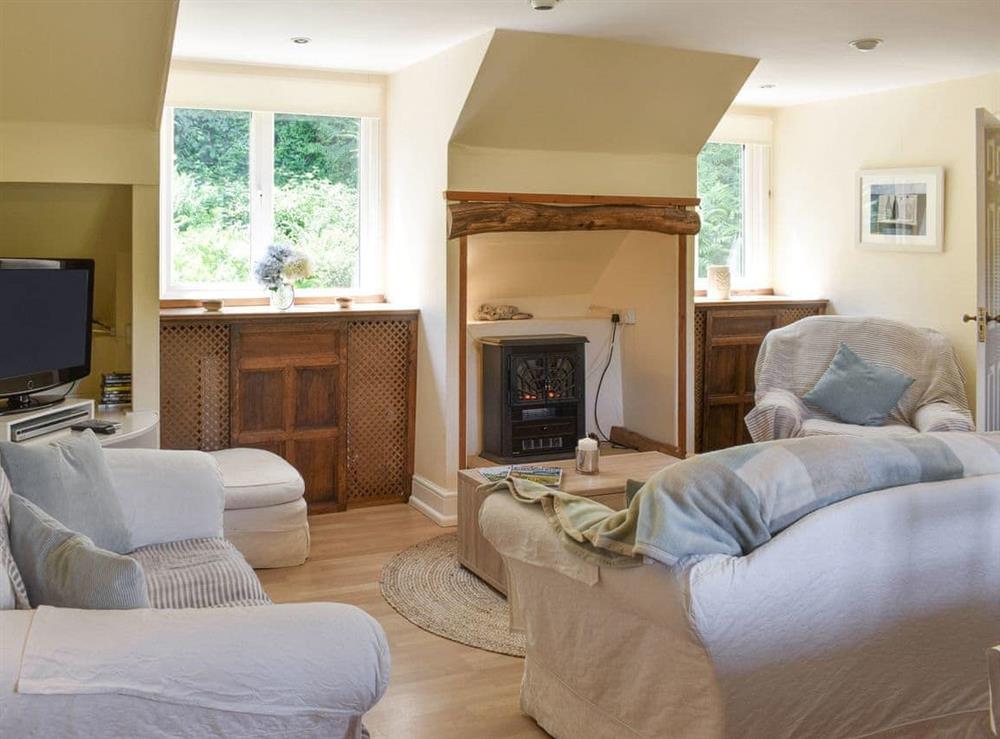 Stylish living area at Clock Cottage, 