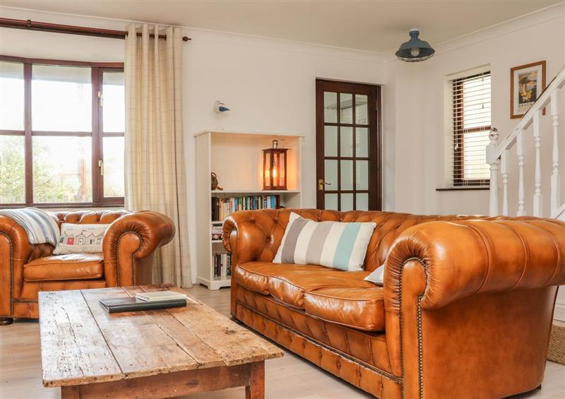 Relax in the living area at Rockham Bay View, Mortehoe