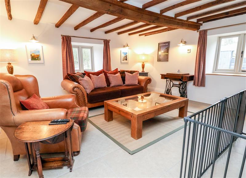 Relax in the living area at Rockhill Farmhouse, Clun
