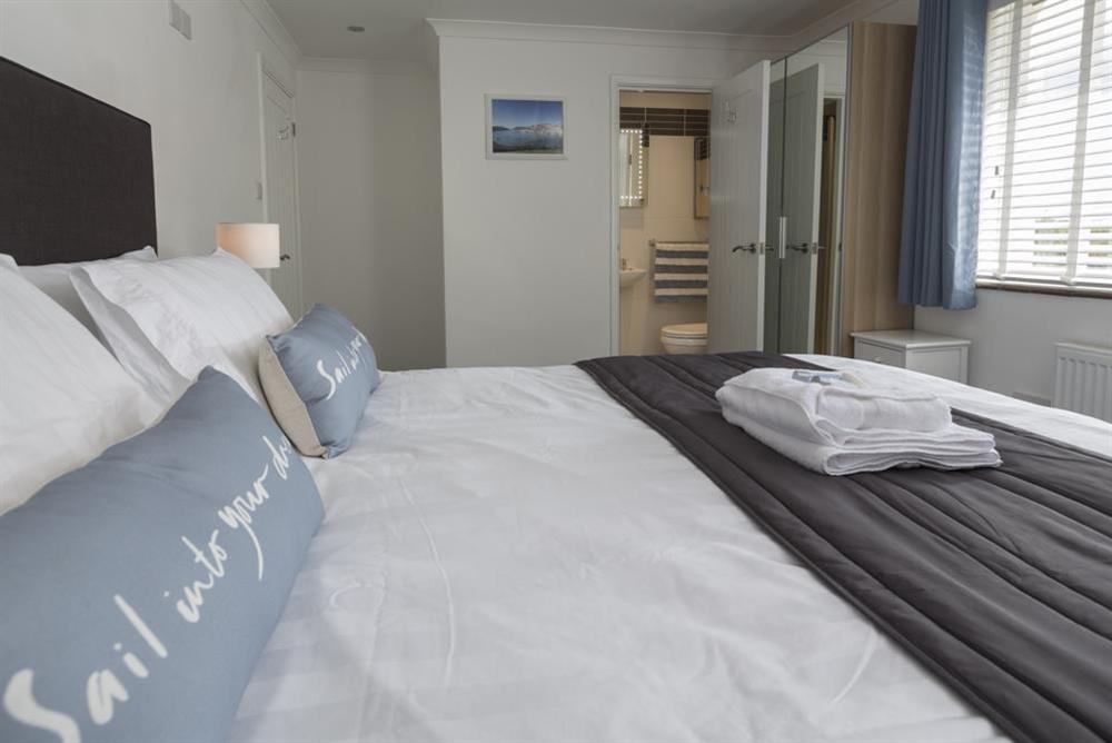 En suite master bedroom with super-King size bed (photo 3) at Rockpoint in , Salcombe