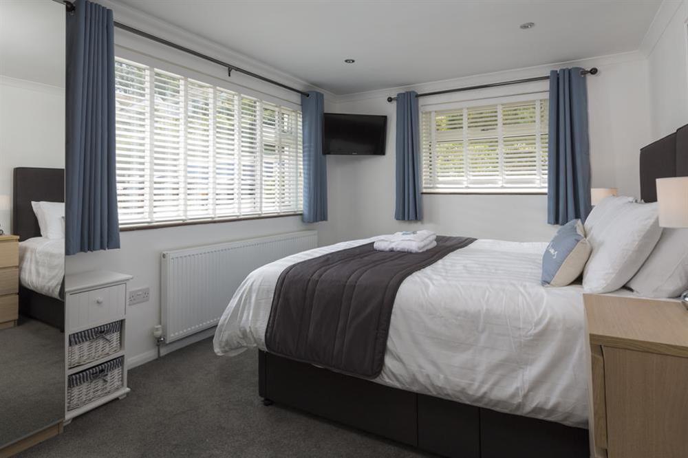 En suite master bedroom with super-King size bed at Rockpoint in , Salcombe