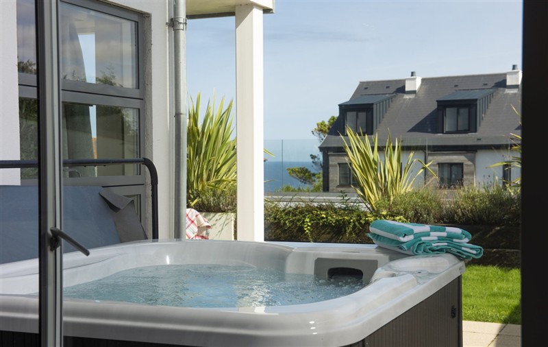Enjoy the hot tub at Rockpool at Salt, Cornwall