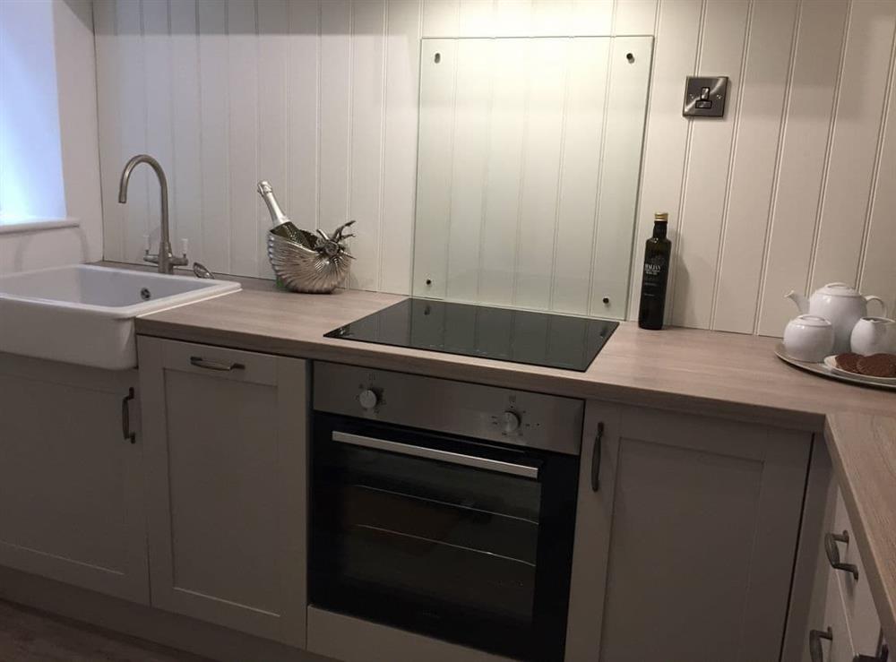 Modern galley style kitchen at Rockpool Cottage in Saltburn-by-the-Sea, North Yorkshire