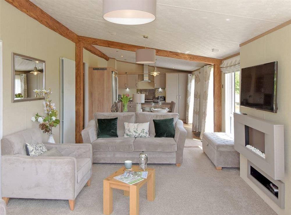 Well presented open plan living space at Rockville Lodge, 