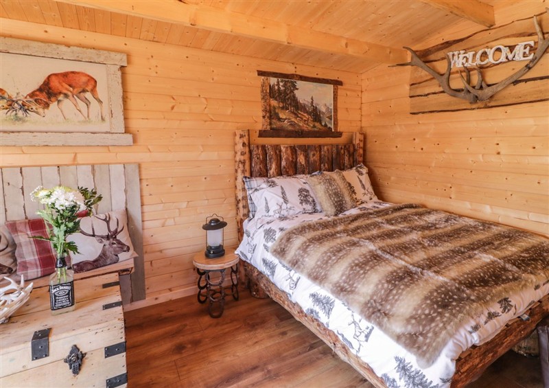 A bedroom in Rocky Ridge Cabin at Rocky Ridge Cabin, Castlerock