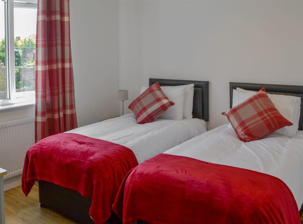 Comfy twin bedroom at ROK House in Amble, Northumberland