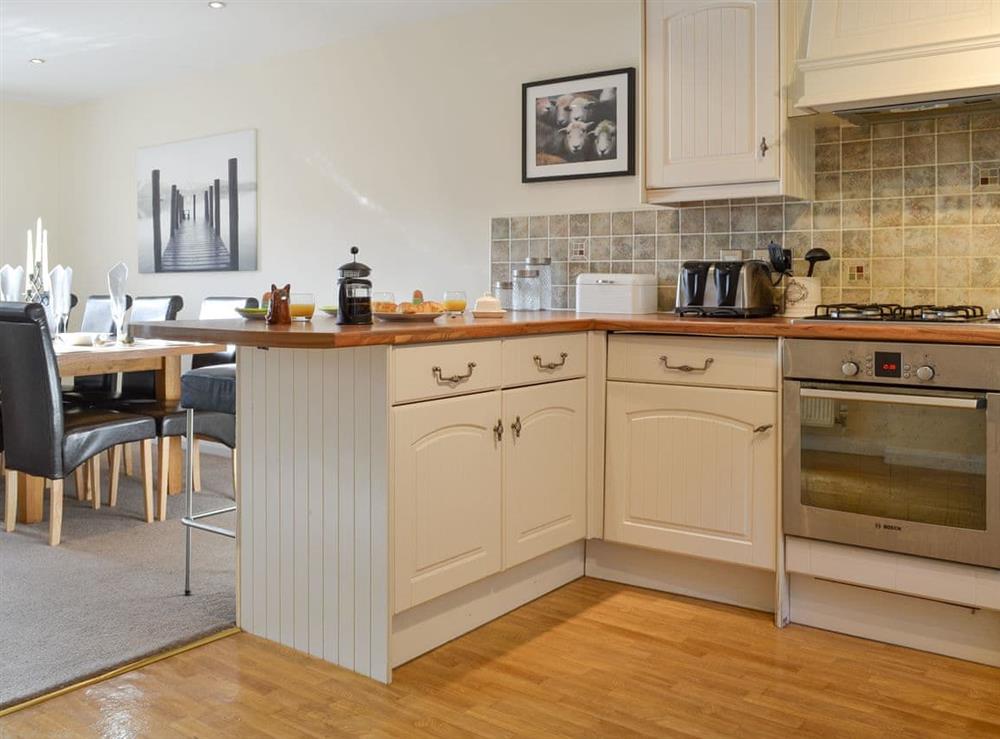 Fully appointed kitchen with dining area at Rolton House in Ambleside, Cumbria