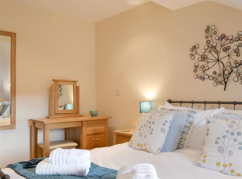 Peaceful en-suite master bedroom at Rolton House in Ambleside, Cumbria