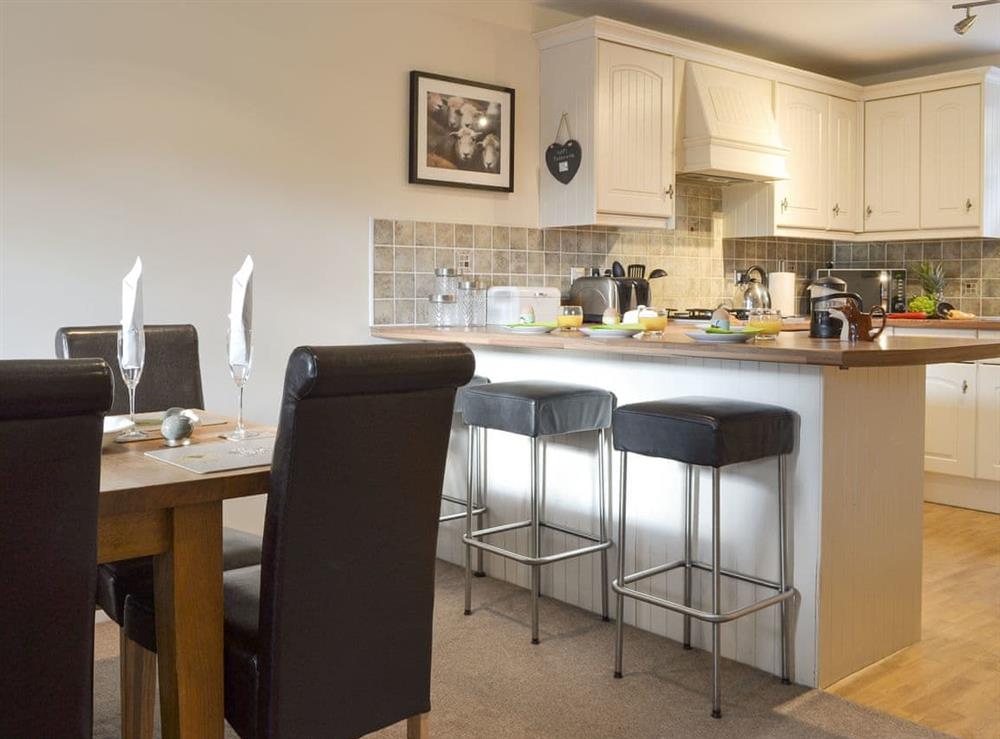 Useful breakfast bar within kitchen/diner at Rolton House in Ambleside, Cumbria