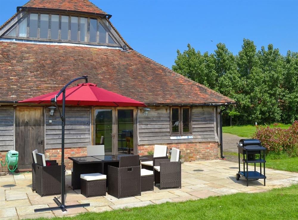 Fantastic patio area with sitting out furniture at Romden Barn in Smarden, near Ashford, Kent