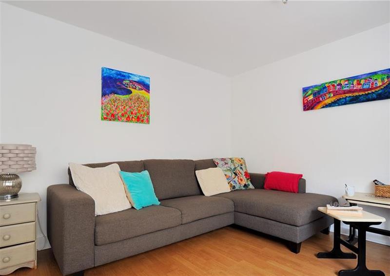 Relax in the living area at Rona Cottage, Lyme Regis