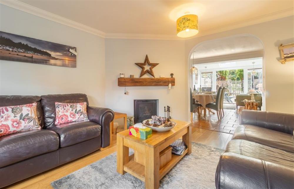 Ground floor: The comfortable sitting room has decorative fireplace at Roof Top View, Wells-next-the-Sea