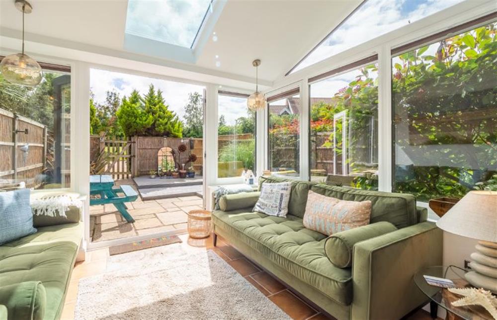 Ground floor: The conservatory overlooks the garden at Roof Top View, Wells-next-the-Sea