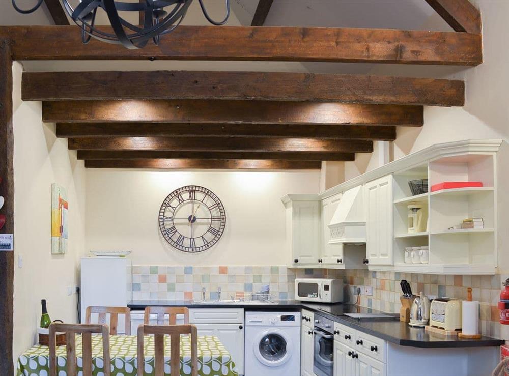 Kitchen/dining room with exposed beams at Rook in Ipplepen, Nr Totnes., Devon