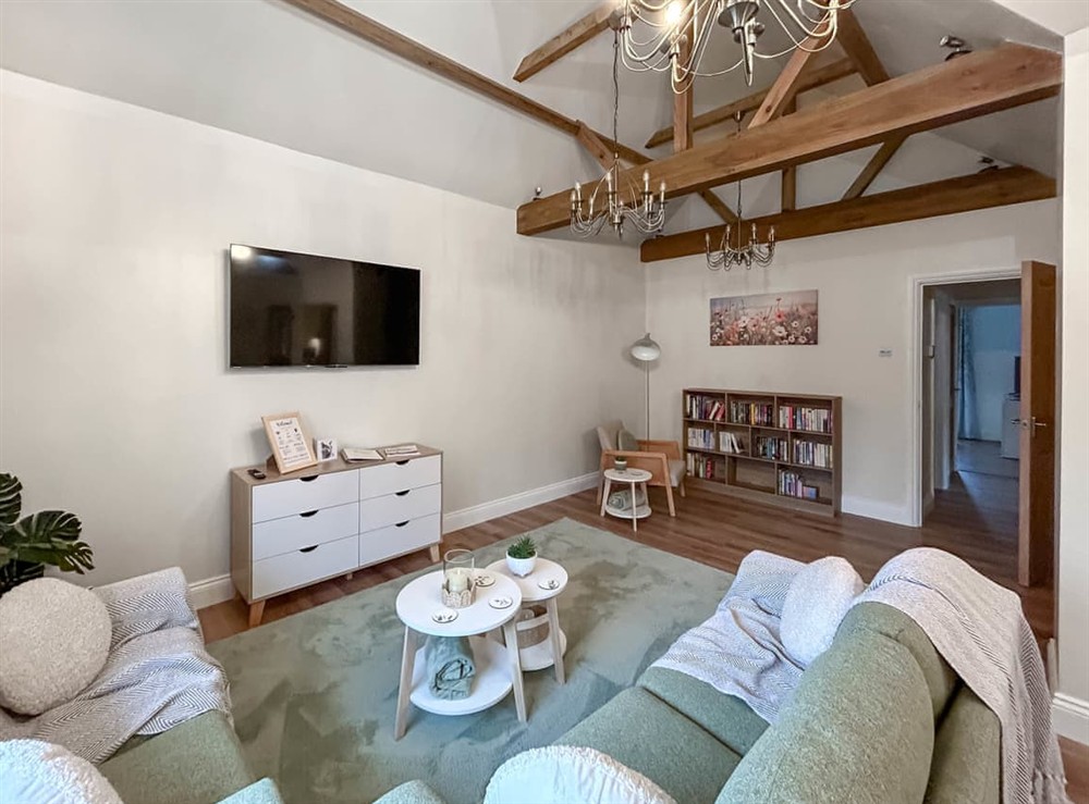 Living area at Rookery Farm Holiday Cottage in Bognor Regis, West Sussex