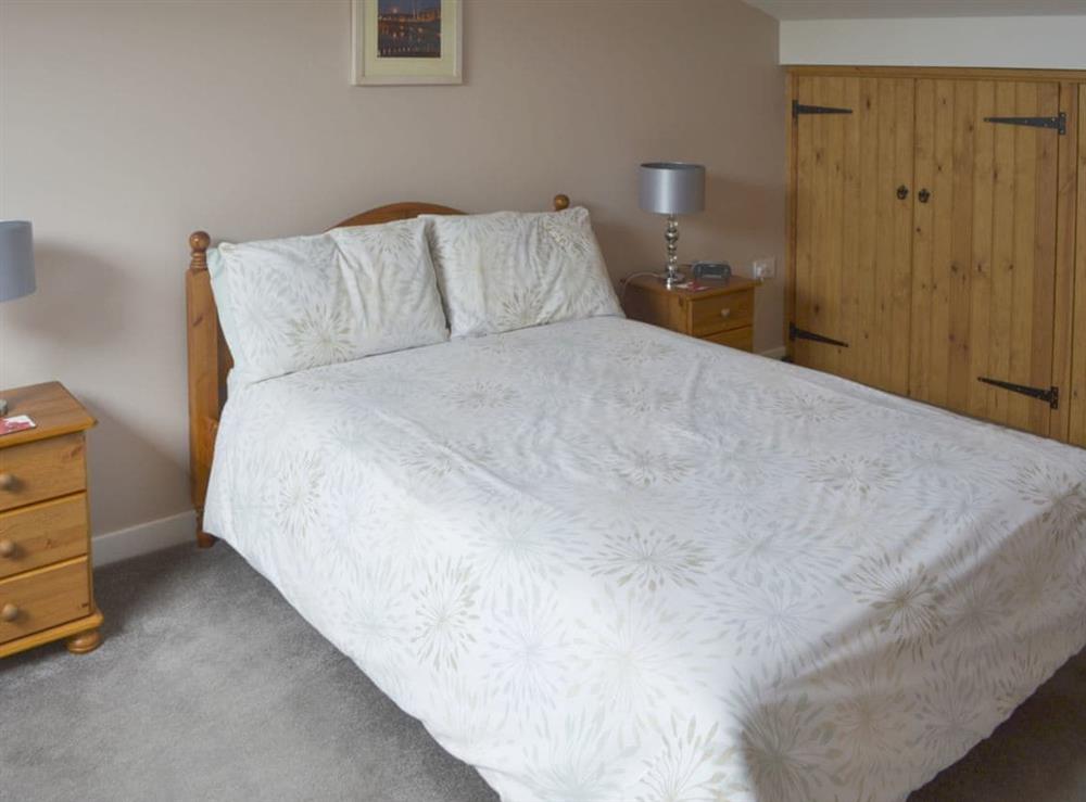 Comfortable double bedroom on upper floor at Clougha View, 