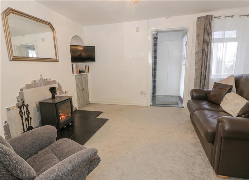 Relax in the living area at Rosalin Cottage, Dreghorn near Irvine
