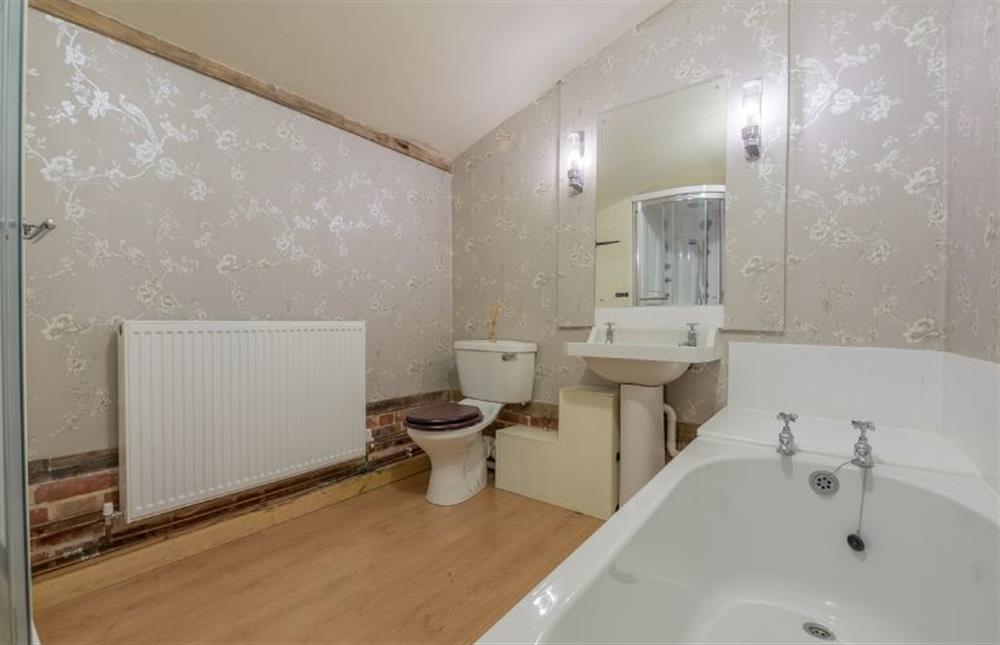 En suite with bath and shower