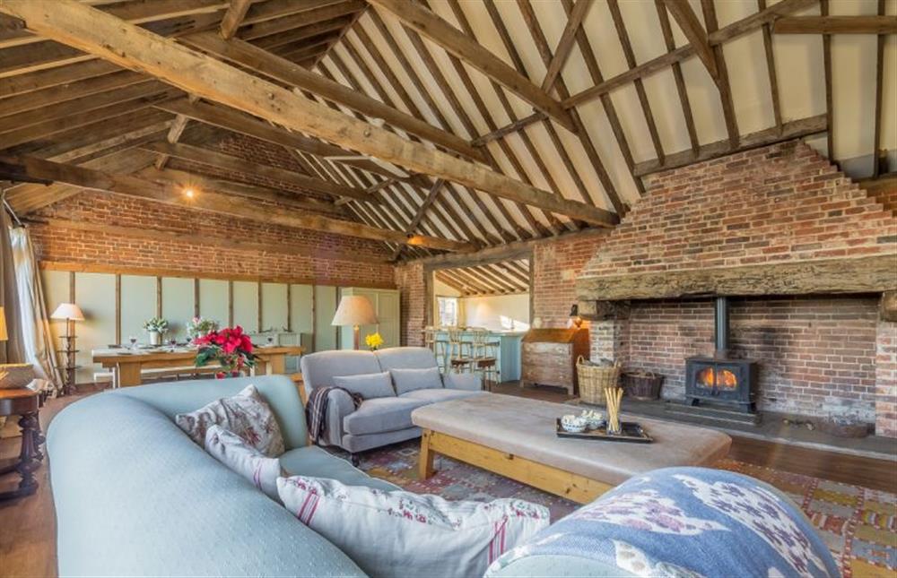 Living area with wood burning stove at Rose and Court Barn, Stoke By Nayland