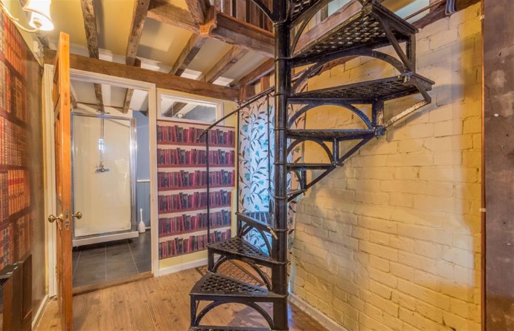 Spiral staircase to mezzanine at Rose and Court Barn, Stoke By Nayland