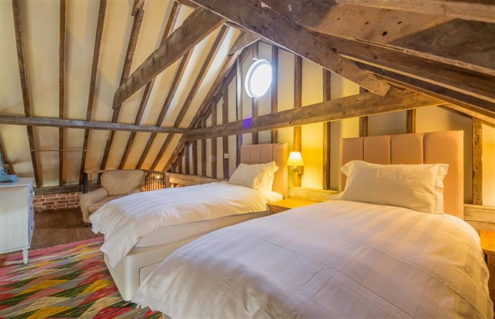 Twin beds on mezzanine floor at Rose and Court Barn, Stoke By Nayland