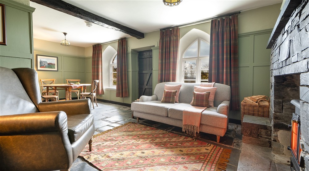 The open-plan sitting and dining room at Rose Castle Cottage in Nr Coniston, Cumbria