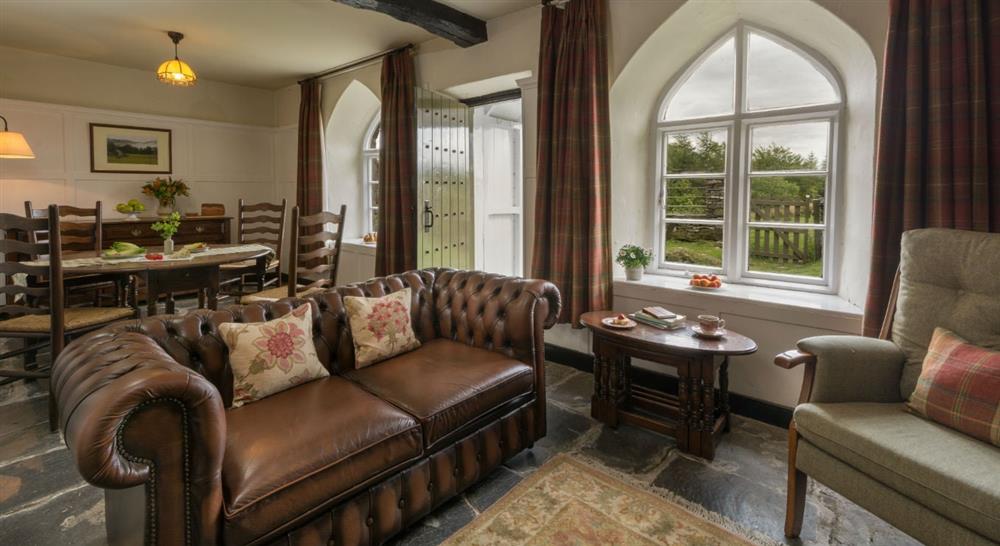 The sitting room and dining room at Rose Castle Cottage in Nr Coniston, Cumbria